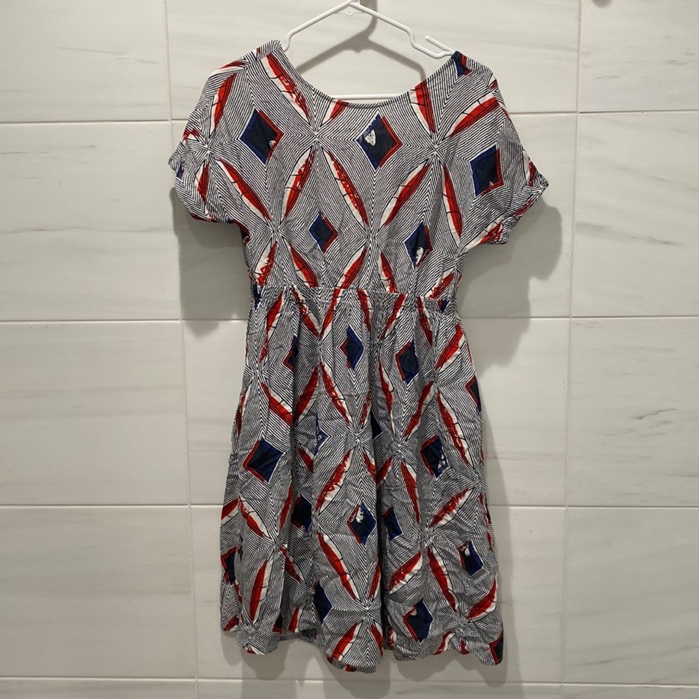 Farrow lace-up back dress in size M.